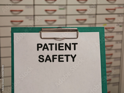 PATIENT SAFETY healthcare and pharmacy concept displayed on a clipboard in a pharmacy