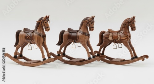 Three vintage wooden rocking horses for children standing in a row as a classic nursery toy collection