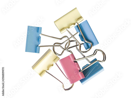 Obraz na płótnie Colorful pastel binder clips pile isolated on transparent background, top view