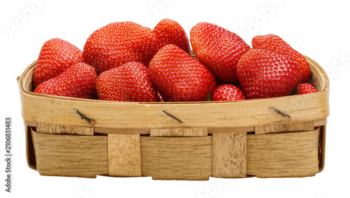 Принти на полотні Isolated fresh ripe red strawberries in a rustic woven wooden basket, healthy su