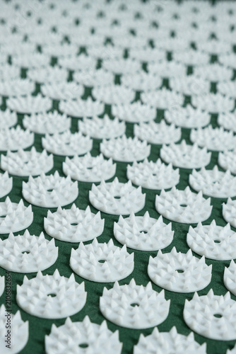 Fotografie Extreme close up of plastic spikes on therapeutic acupressure applicator