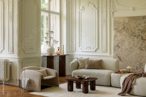 Elegant Living Room with Ornate Walls and Modern Furniture in a Luxurious and Timeless Interior Design