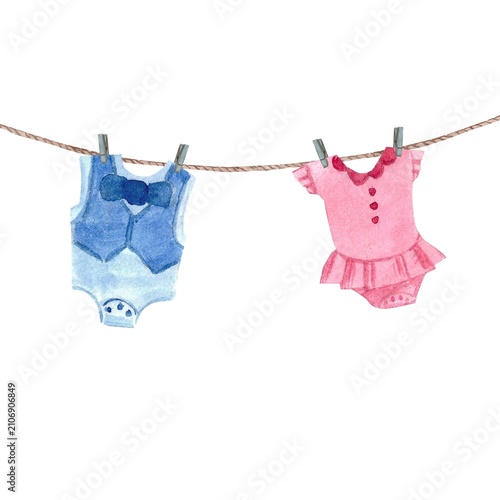 A pink girl's suit and a blue boy's suit hanging on a rope with clothespins, hand-drawn in watercolor on an isolated background. Illustrations for baby show and birthday card and invitation design