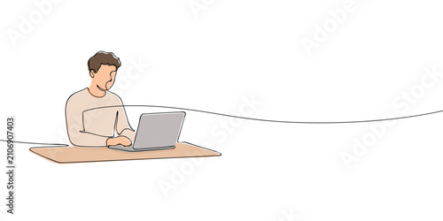 Foto Man working on laptop while sitting on the floor