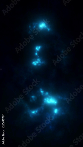 Konstfotografi Bright blue bioluminescence particles drift and float through dark water in the