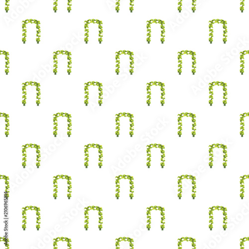 Foto Green foliage archways creating a repeating botanical design on a white backgrou