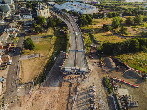 Gateshead UK: 20th July 2026: The demolition of the Gateshead Flyover from a high angle. Nearby buildings and open areas are visible, with construction work ongoing