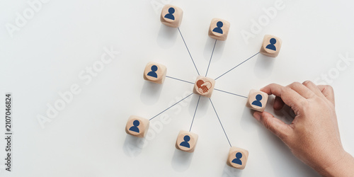 Human centered support network concept, empathy heart icon connecting diverse people blocks, showing emotional intelligence, teamwork, trust, mental health care, compassionate leadership organizations