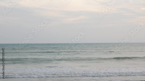 natural landscape sea beach sea water surface while sea waves is coming to shore beach in sunset time.seascape nature summer holiday background,summer beach south of thailand
