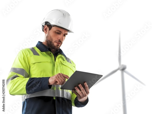 Professional Worker Using Tablet Near Wind Turbine on Bright Background