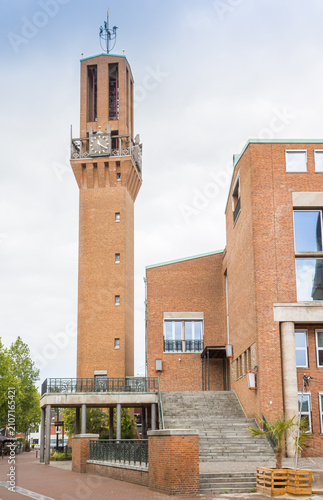 Принти на полотні Grand brick steps ascend toward the historic clock tower of the town hall in Hen