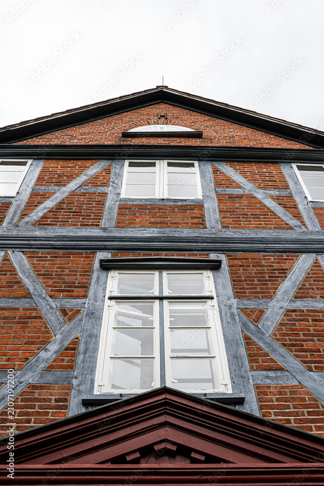 Obraz premium Low angle view of historic timber framed building facade