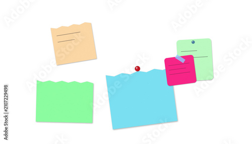 Collection of colorful sticky note pads arranged on a plain white surface for brainstorming with stationery
