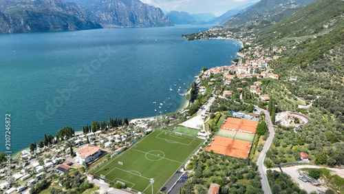 Drone view of Lake Garda with sports facilities and houses in Italy