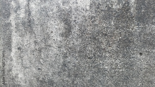 Foto Gray Concrete Texture Background with subtle weathering, gritty details, and nat