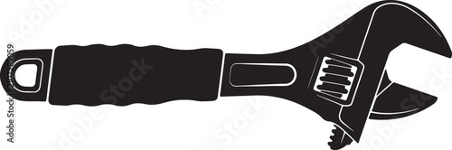 Konstfotografi Black and white silhouette of an adjustable wrench with a textured handle and wo
