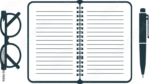 Foto Notebook with spiral binding sits next to eye glasses and a black ink pen tool