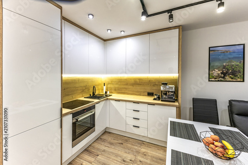 Quadro su tela Modern built-in kitchen furniture, furniture with white high-gloss painted front
