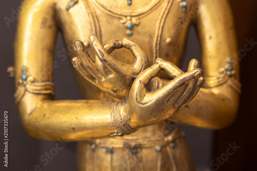 Golden Statue Hands in Sacred Mudra Gesture