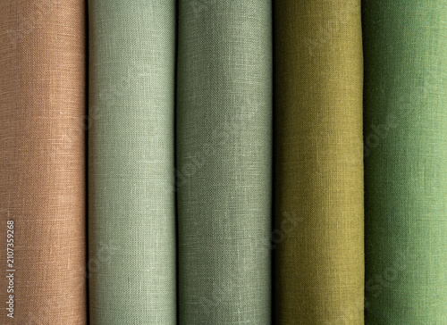 Colorful linen fabric rolls in shop