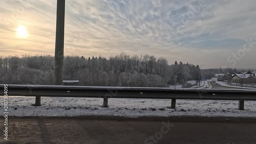 Along the road, winter roadside view, view from the car window. Snow winter day.	