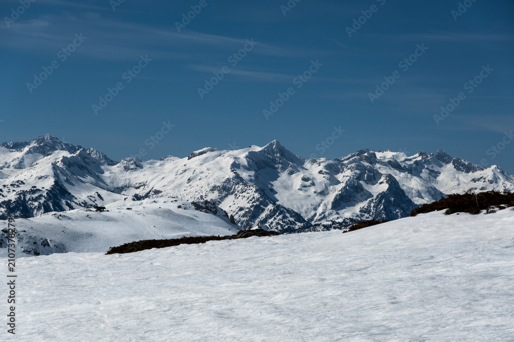 Fototapeta premium Pyrenees mountains covered in snow on a sunny winter day