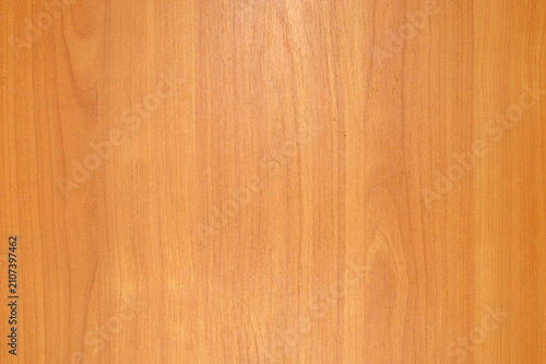 smooth texture of natural light wood with an even grain pattern in a close up shot