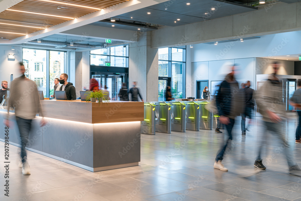Fototapeta premium Office reception with visitors arriving, business motion concept