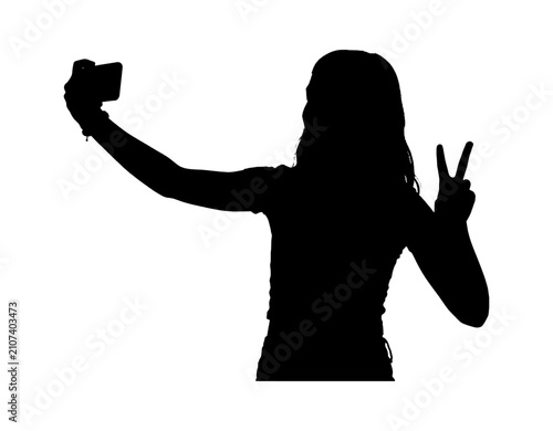 Silhouette of a young woman taking a selfie with a phone and making a peace sign gesture isolated on transparent background, Vector