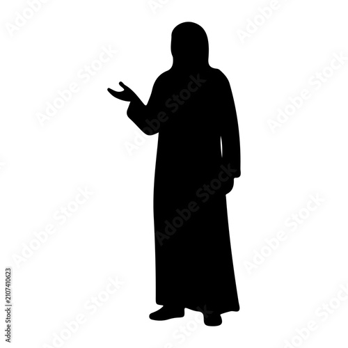 Принти на полотні Silhouette of Woman Wearing Traditional Abaya and Headscarf.