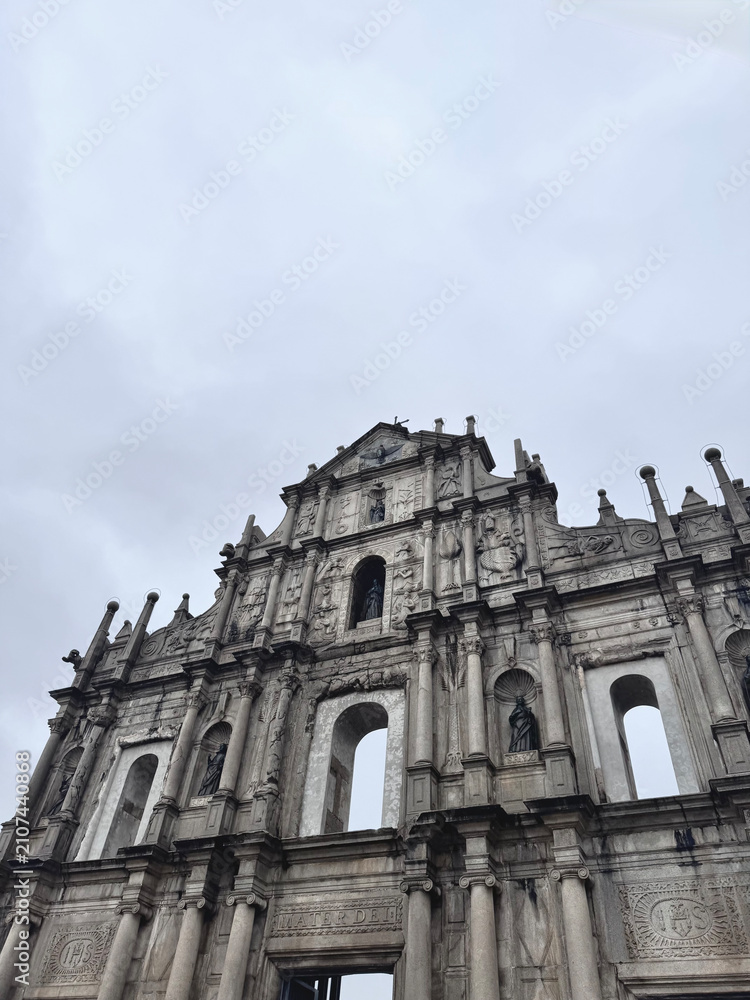 Fototapeta premium Historic Ruins of St. Paul's Cathedral in Macau on a cloudy day