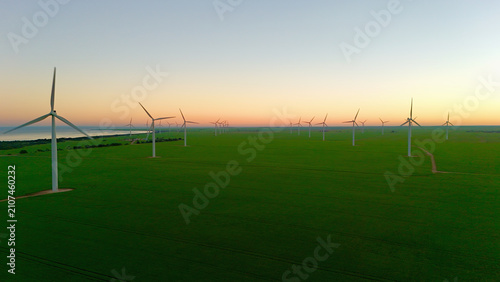 Wattle Point Wind Farm, Edithburgh, Yorke Peninsula, South Australia – 4K aerial drone view of wind turbines, renewable energy, farmland and Spencer Gulf coastline during golden hour and sunset