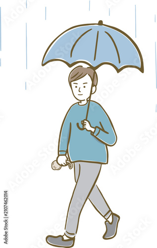 雨の日に傘をさしてエコバッグを持って歩く男性