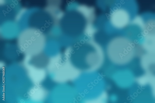 Soft blue and teal bokeh light glow defocused abstract background with sparkling blur circles