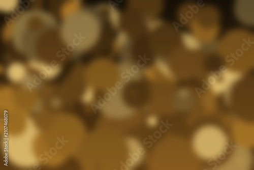 Soft gold and amber bokeh light glow defocused abstract background with sparkling blur circles