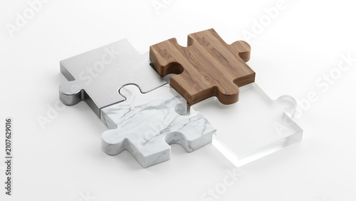 Four puzzle pieces made of different metal wood marble and acrylic interlocking connection