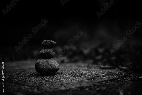 zen stones on black background