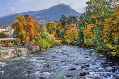River Passer with riverside promenade in the spa area in autumn, Merano, Burggrafenamt, Adige Valley, South Tyrol, Italy