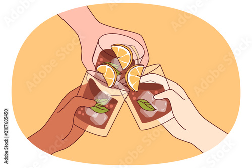 Alcohol drink in glasses in hands of people drinking whiskey with pieces of lime and ice cubes. Alcohol party for bar visitors enjoying cold strong brandy or cognac from restaurant wine list