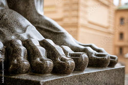 Fotografie Close Up of a Granite Statue Feet at a Historic Portico