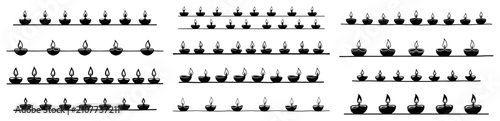 Foto Diya oil lamps arranged in horizontal borders for Diwali festival decoration in