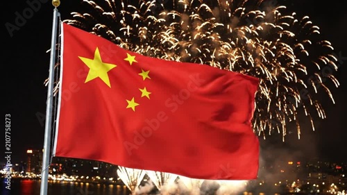 National Flag of China Waving Against Fireworks in Night Sky