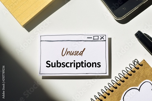 Unused subscriptions written on hand drawn web browser page on desk. View from above. Tracking and managing your digital subscription concept.