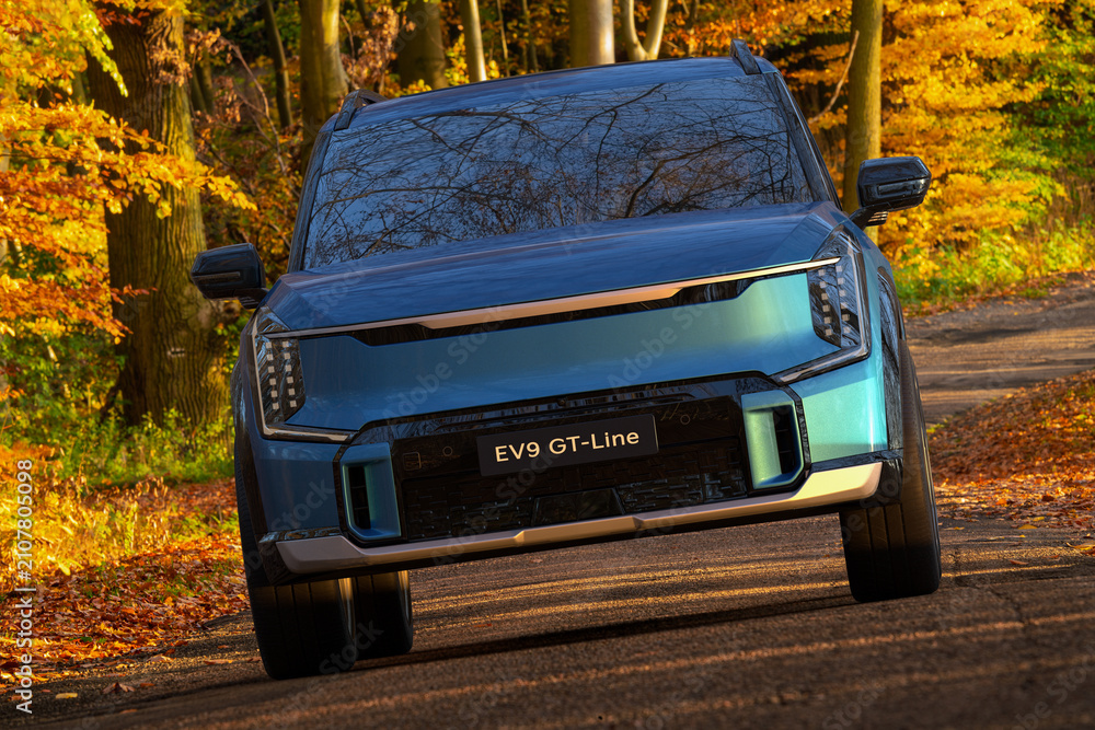 Obraz premium The Kia EV9 GT on the road.3D rendering.