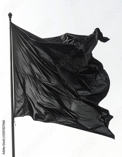 A stark black flag flutters dynamically against a bright white background
