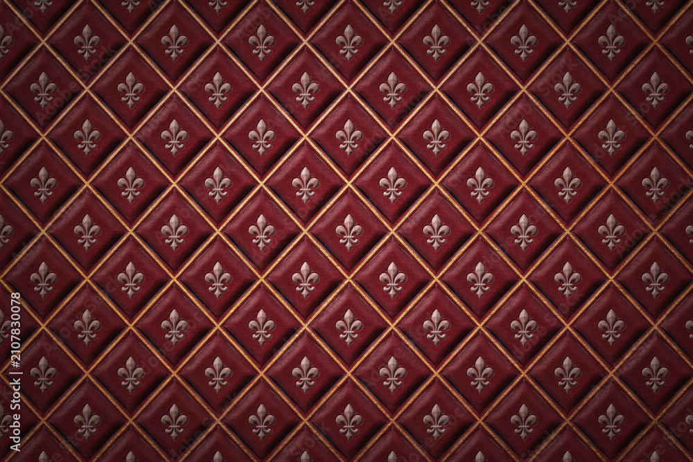 Obraz premium Deep burgundy red leather upholstery with a diamond tufted pattern and metallic silver fleur de lis symbols centered in each quilted section