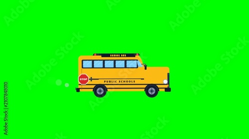Animated yellow school bus on green screen background video.