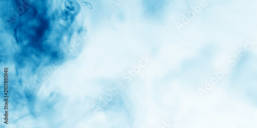 Light blur background with cyan, blue fog floating in the air.