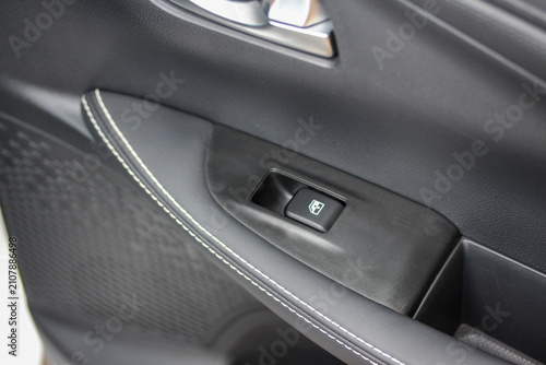 Power window switch in the rear door of a new vehicle