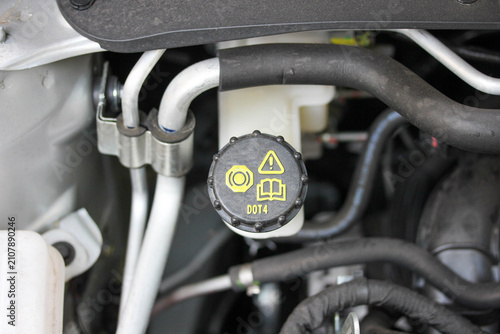 Brake fluid reservoir in the engine bay of a new vehicle